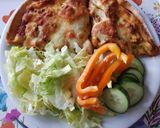 A picture of step 13 of Completely homemade chicken madras pizzas.