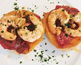 Foto del paso 5 de la receta: Pincho de langostinos  con piquillos caramelizados