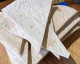 A picture of step 3 of Homemade crispy tortilla wrap dippers.