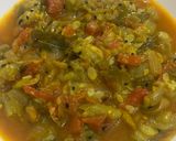 A picture of step 6 of Turaii (Ridge gourd) with kalonji and curry leaf.