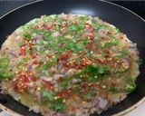 A picture of step 6 of Masala Omelette.