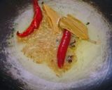 A picture of step 1 of Matar masala.