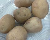 A picture of step 1 of Potato paratha with onion raita.