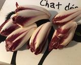 Une image de l'étape 1 de Salade d endives rouges et tomates au thon.