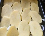 Foto del paso 5 de la receta: Pollo al horno con papas y muzzarella