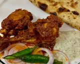 A picture of step 12 of Chicken Tandoori Masala with Paratha.