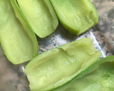 Foto del paso 4 de la receta: Calabacines rellenos de tomate y queso
