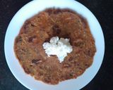 A picture of step 5 of Arrowroot mix thalipeeth with white butter.