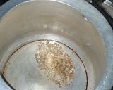 A picture of step 1 of Vegetable Dalia pulaw.