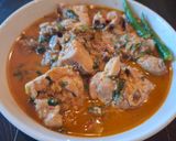 A picture of step 4 of Dahi Chicken Curry with Fenugreek Leaves.