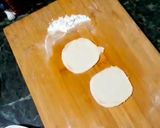 A picture of step 9 of Italian panner ravioli with pink sauce.