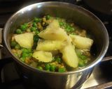 A picture of step 5 of A green koottu with Mung, green peas, and kale.