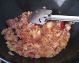 A picture of step 2 of Tamarind chicken curry with potatoes.