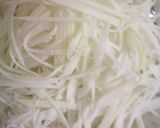 A picture of step 2 of Spicy Raw Papaya Salad.