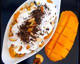 A picture of step 6 of Creamy Mangoes with nuts🥭🥭🥭🥭🥭.