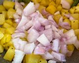 A picture of step 4 of Aloo Posto.