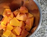 A picture of step 2 of Sweet Papaya -Orange Shots.