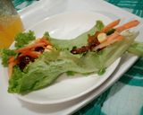 A picture of step 6 of Beef latus wrap.