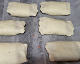 Foto del paso 4 de la receta: Cañas de hojaldre con champiñones, jamón york, queso y virutas de jamón serrano