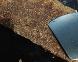 A picture of step 7 of Ragi onion rava dosa with hotel style coconut chutney.