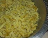 A picture of step 1 of Macaroni with baked beaf and steam spinach with brocolli.