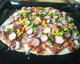 A picture of step 6 of Smokie pizza.