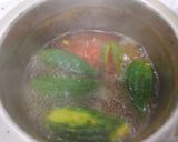 A picture of step 2 of Bharwa karela.