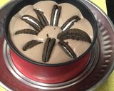 A picture of step 8 of Eggless: Oreo Chocolate Vanilla Ice Cream Cake.