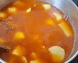 Foto del paso 4 de la receta: Patatas con calamares