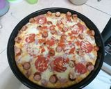 A picture of step 5 of Choma sausage pizza.