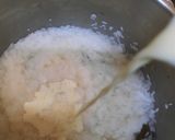 A picture of step 5 of Nolen gurer payesh or Rice kheer with date palm jaggery.