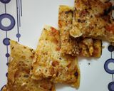 A picture of step 5 of Stuffed uttapam.