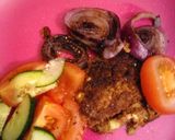 A picture of step 3 of Burger mix, spring onion, tomato and Cumin.