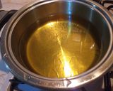 Foto del passaggio 4 della ricetta Carciofi fritti in pastella