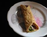 A picture of step 3 of Mexican wrap.