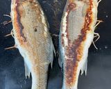 Une image de l'étape 5 de Bars farcis oseille, persil, ail et oignon grillés à la plancha.