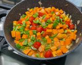 A picture of step 12 of Sweet Potato with Green Bell Pepper and Tomatoes in Fruity Sauce.