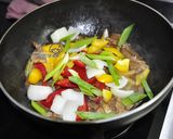 A picture of step 6 of Teppanyaki-Style Stir-Fried Beef with Scallions.