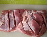 A picture of step 3 of Rolled Pork belly stuffed with Sage and onion stuffing.