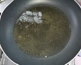 A picture of step 2 of Tomatoes sauce.