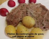 Foto del paso 16 de la receta: Filetes de contramuslo de pavo con papas al horno