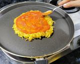 A picture of step 4 of Maggi Pizza.