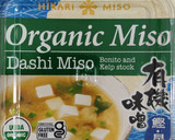 A picture of step 6 of Miso soup with tofu, daikon, onion.