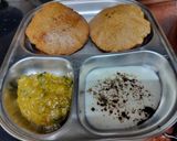 सिंघाड़ा आटा पूरी कद्दू की सब्जी और दही रेसिपी चरण 5 फोटो