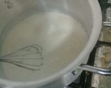 A picture of step 4 of Konafah pistacio with cream.