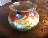 A picture of step 4 of California Farm Fresh Salsa, layered.