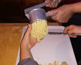 Foto del passaggio 10 della ricetta Passatelli in brodo