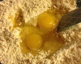 A picture of step 2 of Cake mix cookies .