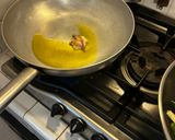A picture of step 1 of One-Pan Spaghetti with Clams, Zucchini, and Saffron.