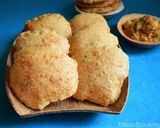 A picture of step 9 of Bedmi puri (spiced whole wheat Indian puffed bread).